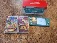 Barely used switch lite with two games
