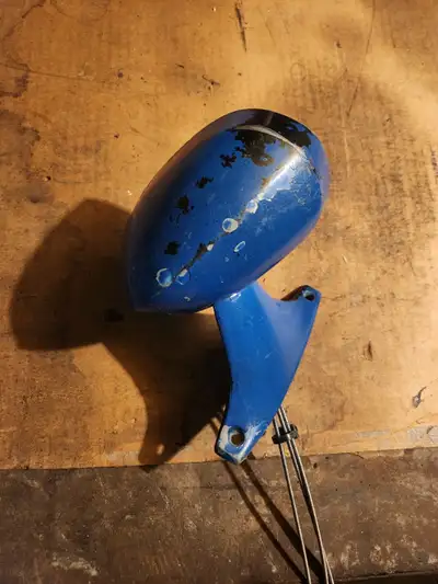 Drivers' side mirror for 1972 - 1974 Plymouth Barracuda. Includes adjustment control with cables.