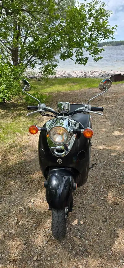 For sale is a well-loved 2009 Yamaha Vino scooter, known for its reliable performance and stylish re...