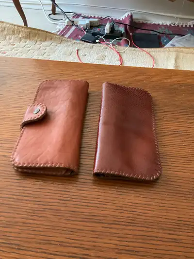 two leather wallets, View more