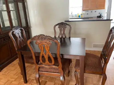 Real wood dining table and 4 chairs - Ashley furniture Dimensions: 48 inch table $700 or best offer