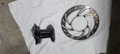 Some crf parts Upper clamp with zeta bumpers $50 Front wheel hub with oem rotor $80 Nissen front cal...