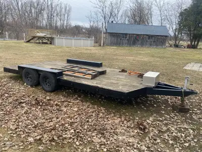 16’ x 8’ flatbed with double axels (3500lbs ea ) With 8500 lb battery operated winch. Includes ratch...