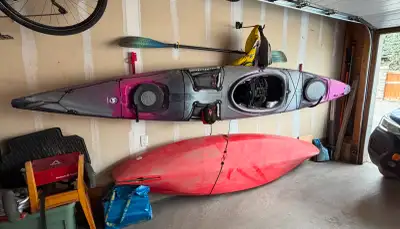 Two rigid kayaks / cart / carrier / storage system New about $3450; I'm selling for less than half p...