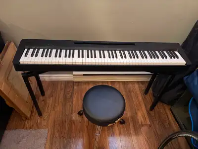 Yamaha P-145 Digital Piano with QuikLok WS-550 stand, View more