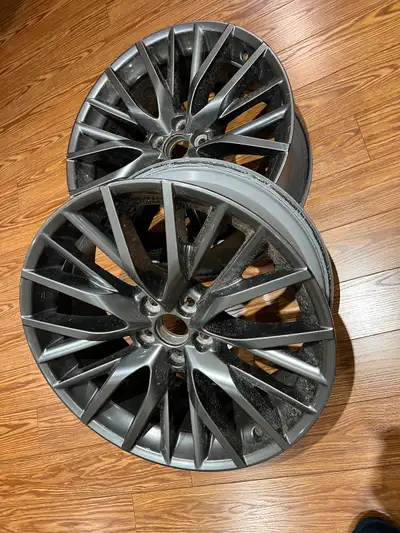 235 55R20 RIM. Used but like new with minimum used signs.