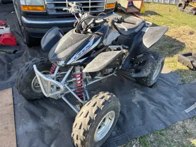 2004 honda 450r. Has coolant leak on bottom of engine and carb needs to be cleaned or rebuilt. It wi...