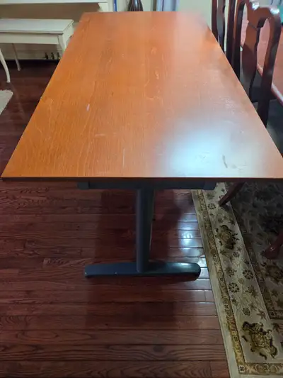 Solid wood and metal table., View more