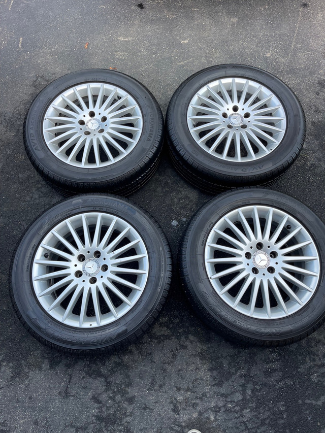 Mercedes OEM 20-Spoke alloy wheels w/ like new Yokohama tire  in Tires & Rims in St. Catharines