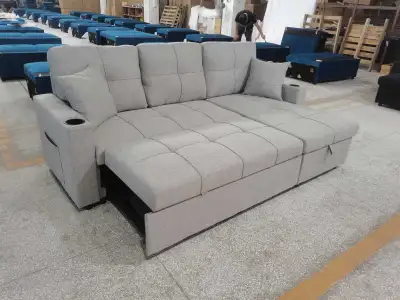 This brand new grey sectional sofa is designed for ultimate comfort and versatility. Its modular des...