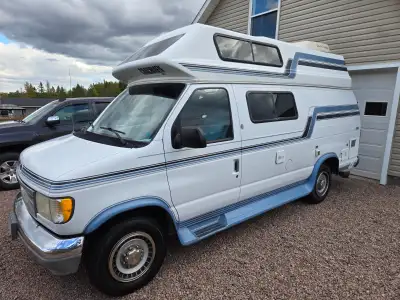 1994 Ford Econoline E250 Camper Van – $29,500 A hard-to-find classic camper with room to stand and p...
