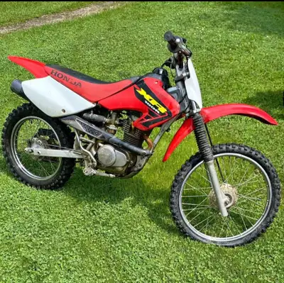 Honda 100crf has a new back tire runs great