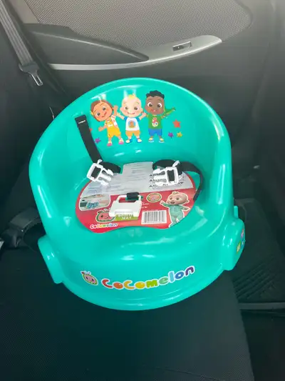 Brand new Cocomelon booster seat. Max weight: 50 pounds. Fits most dining chairs. Smoke/pet free. $2...