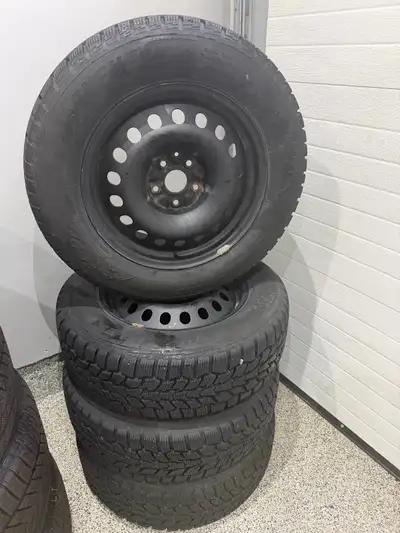225/65R17 WINTER TIRE SET WITH STEEL RIMS Only used for a year - changed cars and don’t need them an...