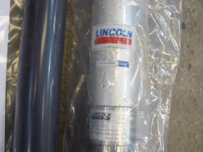 Lincoln pneumatic transfer pump, still sealed in plastic, in original box. Fits 205 liter drums. Lis...