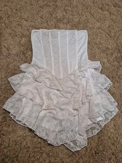 There is a small staining on the skirt from Halloween. Medium