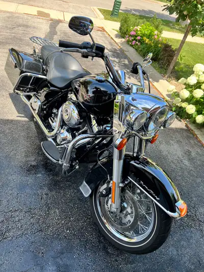 This is a 2009 Harley Davidson FLHR Road King with 60,500 km Vance & Hines Pipes. Serious Inquiries...