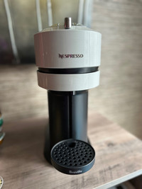 Nespresso Vertuo by Breville with milk frother, pods and storage