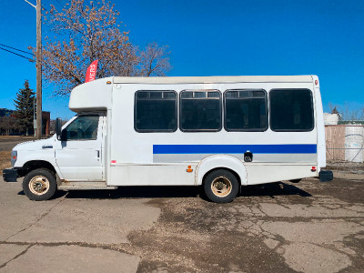 2012 FORD E450 12 passenger bus with manual wheelchair lift