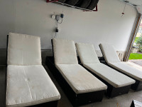 Outdoor loungers (4) plus 2 side tables.   Beautiful chairs
