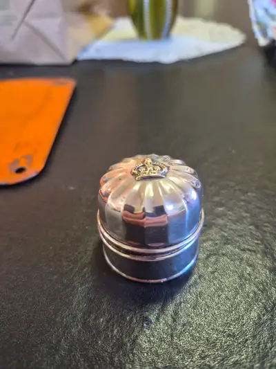 Two beautiful antique sterling silver ring boxes Dome top is 150 the square ring box is 100 call 506...