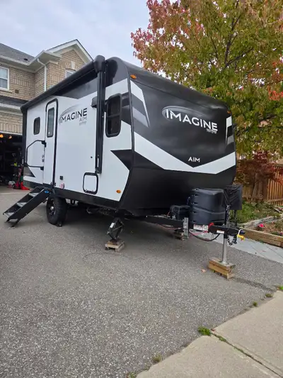 I'm selling a like-new 2023 Grand Design Imagine AIM 15BH travel trailer, perfect for adventurous ge...