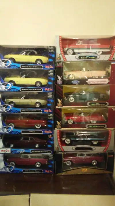 THESE ARE 1:18 SCALE VINTAGE MODEL CARS FOR SALE ALL ARE NEW IN MINT CONDITION IN ORIGINAL BOXES NEV...