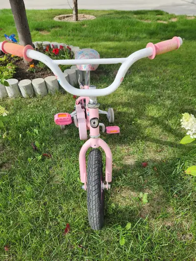 Bicycle with training wheels, View more