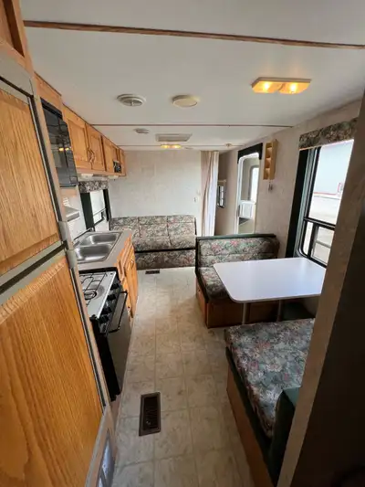 Sea hawk Camper trailer Needs work with plumbing,heating and ac works Floors still solid