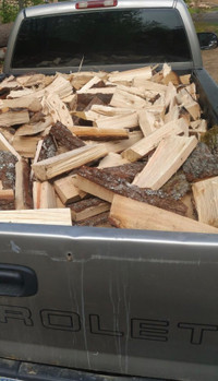 Thrown 8ft 3/4 ton truck box of firewood 