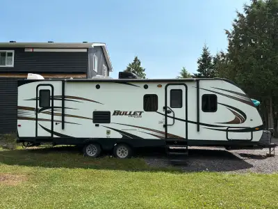**The Perfect Home on Wheels:** Measuring 27 feet in length and 8 feet in width, this spacious campe...