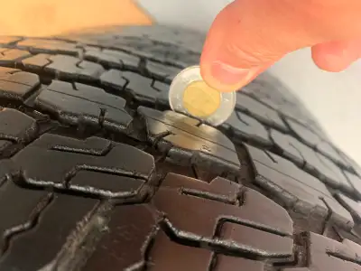Four excellent condition Goodyear Wrangler all terrain adventure tires off rim with good tread left....