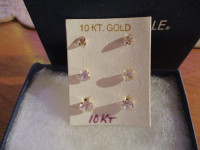 3 pairs of Diamonelle 10 kt gold solitaire pierced earrings