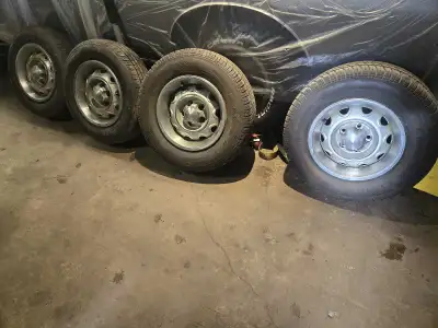 4 dodge rally rims good condition 14 inch with new tires 400$ located near guysbrough off a 1974 dod...