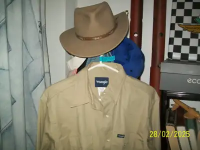 Cowboy shirt, actually bought in Texas, never worn, large, Wrangler brand, $25 (firm). Cowboy hat sm...