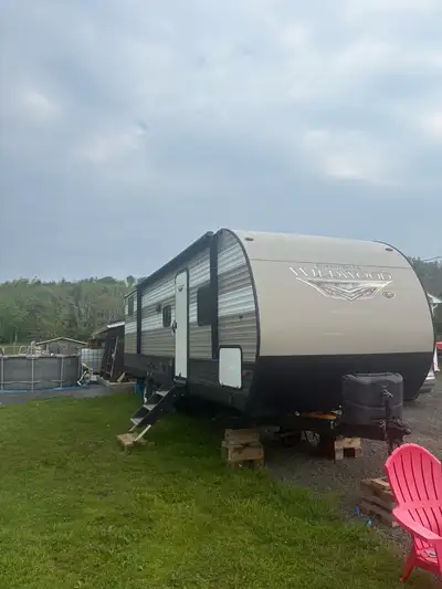 Sleeps 8 4 bunks in the rear Pull out couch Table turns into bed Queen in master Stove top and micro...