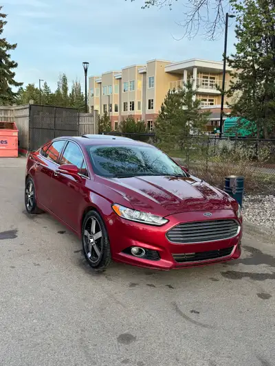 2013 Ford Fusion Titanium Luxury, performance, and technology — this 2013 Ford Fusion Titanium is a...
