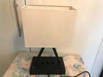 Tabletop bedside lamp. Modern design. Comes with the LED light bulb. No turn on and turn off switch....
