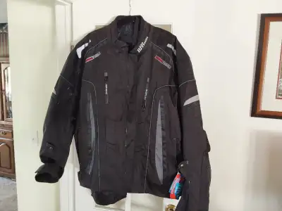 Coat is a new 4XL motorcycle coat, zip in lining for cooler days, removable protective pads. Over $4...