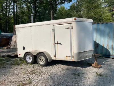 12 foot cargo trailer with 14’ to the nose. A few dents, ramp door works but may need reinforcement....