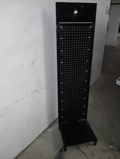This pegboard, freestanding display stand is good to show any packaged goods and various accessories...