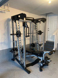  Nautilus Smith Rack with Bench and Weights