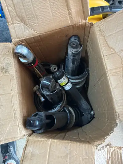 Leftover parts from installation of a lift kit, shocks and struts and hangers. Open to offers. Rough...