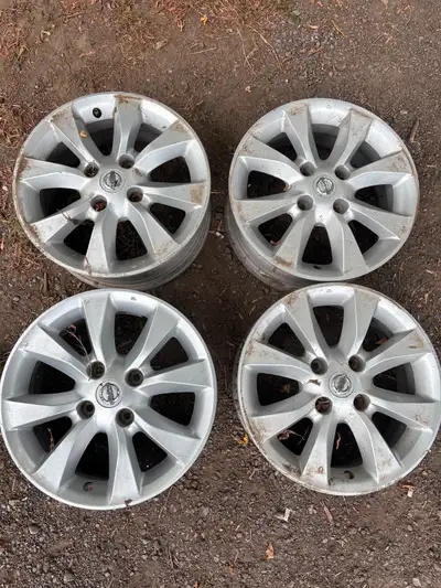 USED SET OF 15" NISSAN WHEELS 15X6 4X4.5 CASH AND CARRY INSTALLATION IS AN ADDITIONAL COST