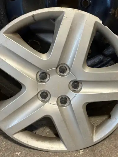 Motomaster 235/65 R17 Tires on rims Fits Kia Sorento, selling because I sold my SUV Includes hub cap...