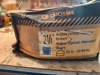 50 lb open box of 2-1/4 inch ardox / spiral nails. maybe a few have been taken out. OBO