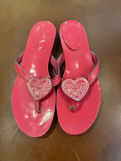 Fun design. Good condition. Red with “Coach Poppy” words in a heart shape on the front. Funky design...