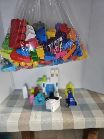 This set includes a variety of colourful blocks and figures. It's in used condition, but still provi...