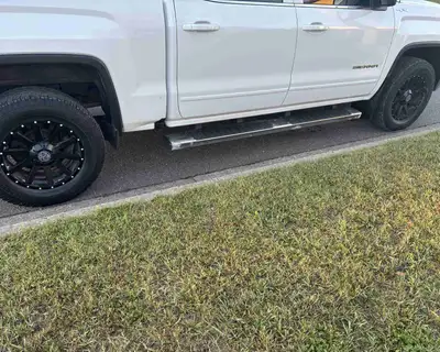 4- RSSW black 6 stud rims with winter tires Lt27565R18. Tires are worn but rims are in great shape....
