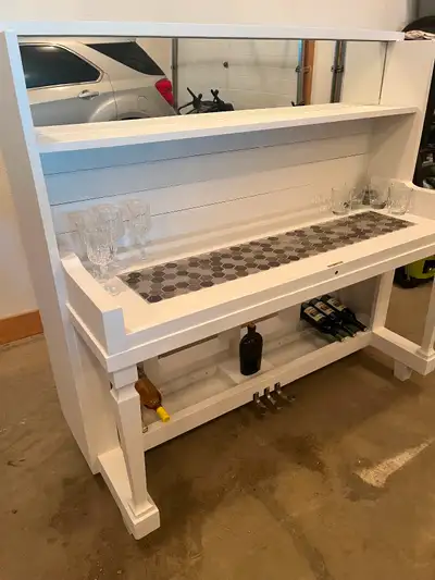 61” x 57” x 27”. Refurbished piano
